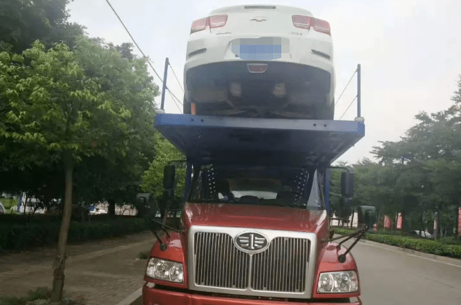 重慶汽車托運公司托運用大板車嗎？-鑫邦運車